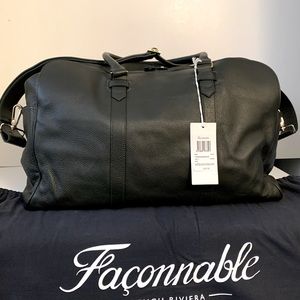 Rare mens green leather travel bag.